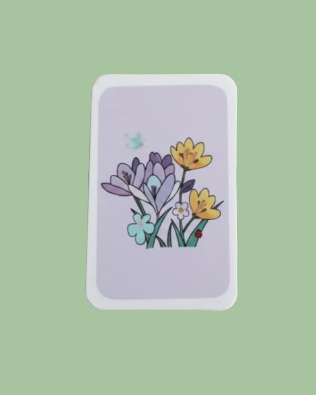 Sponge with floral design on a light purple background