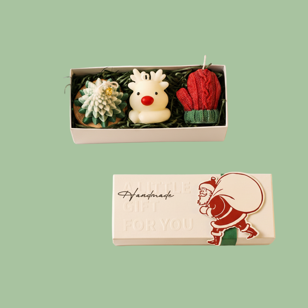 Set of small decorative items in a box with a Santa Claus design on the packaging.