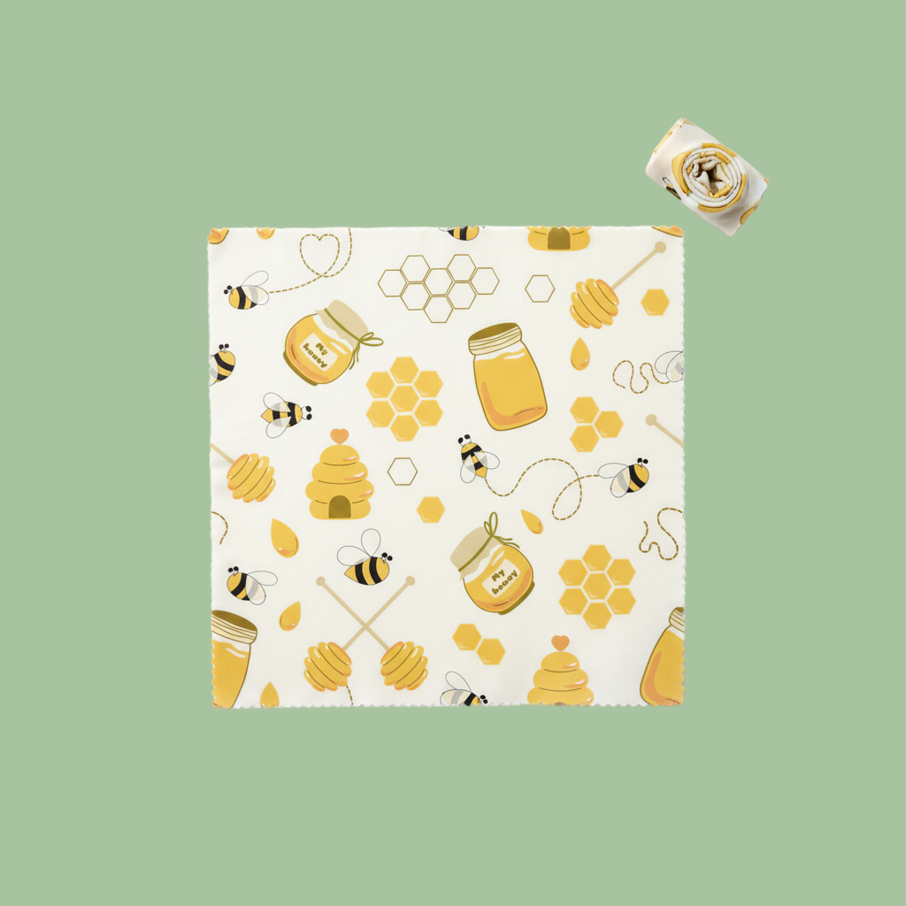 Patterned paper with honeycomb, bees, and honey jars on a white background