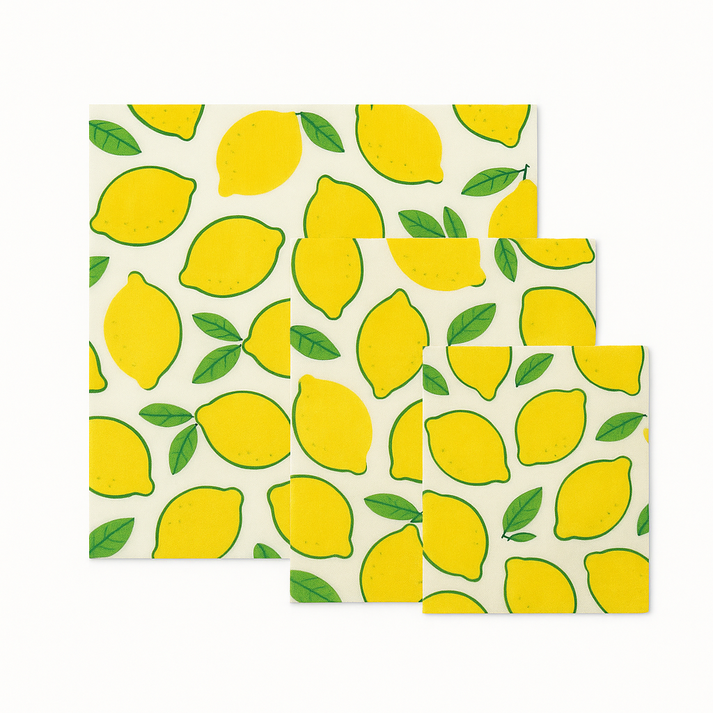 Set of three paper plates with yellow lemon pattern on a white background