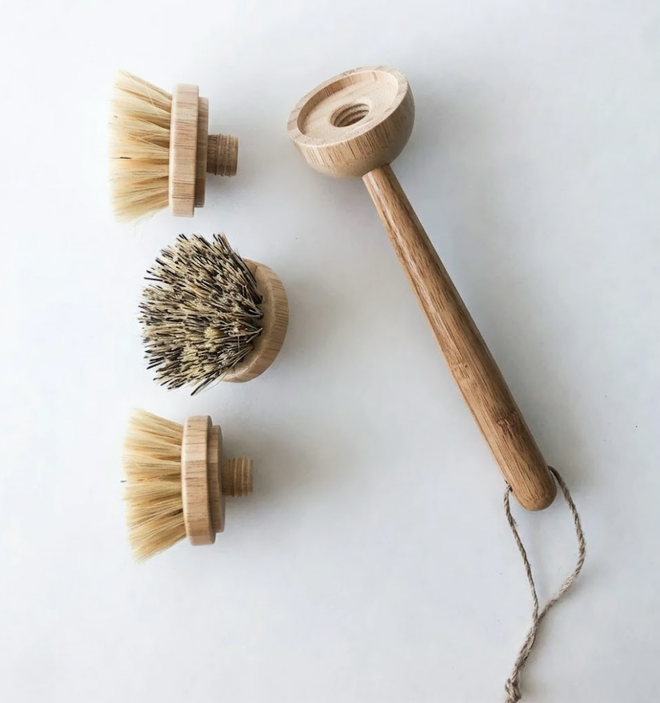 Set of wooden cleaning brushes on a white background